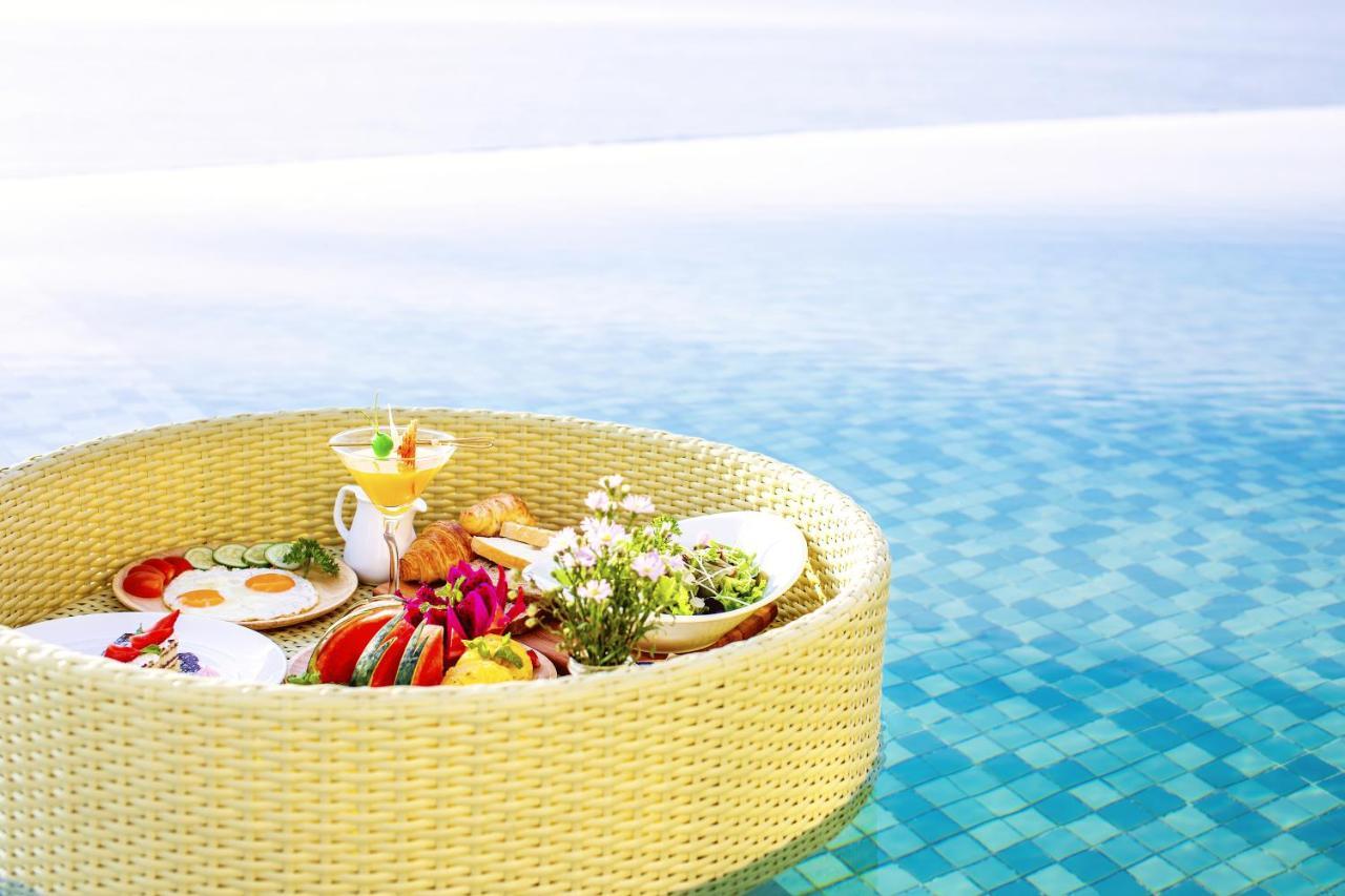 Maximilan Danang Beach Hotel Extérieur photo