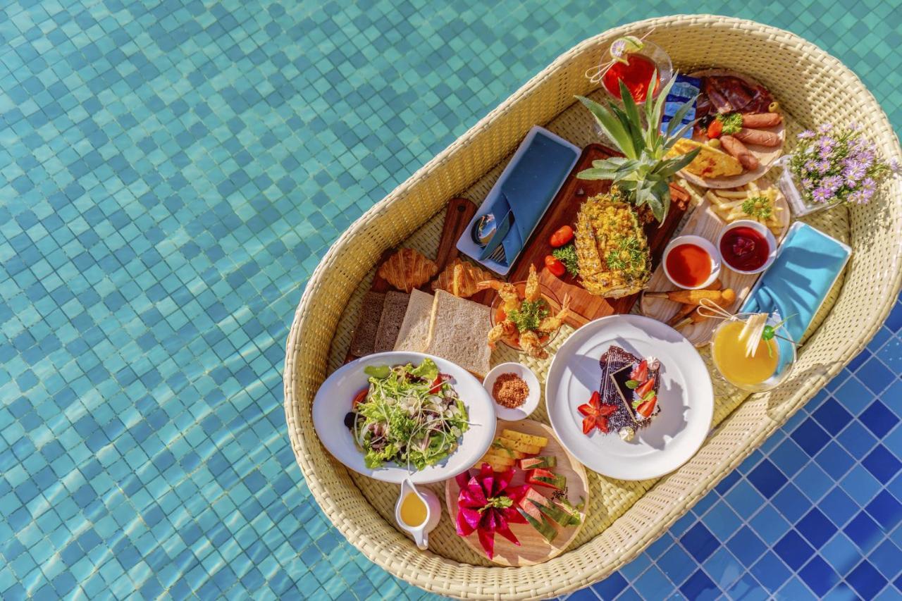 Maximilan Danang Beach Hotel Extérieur photo