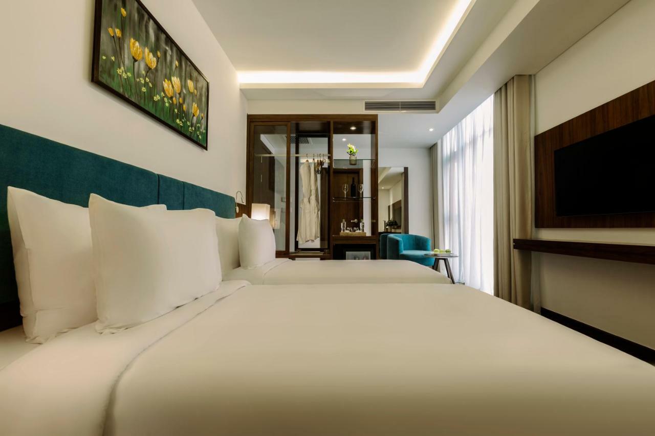 Maximilan Danang Beach Hotel Extérieur photo